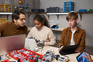 Artificial Intelligence in Web Development - Children building robots
